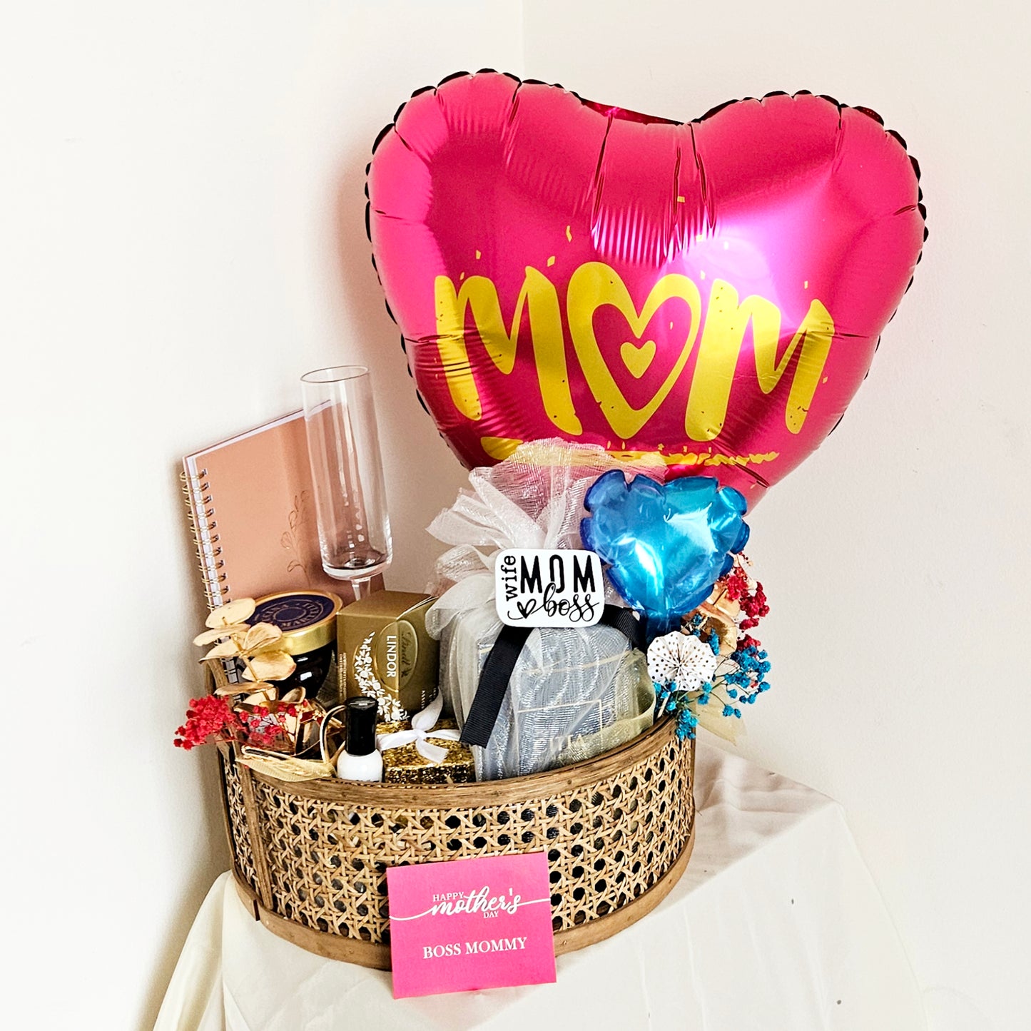 Mother's Day Hamper for the Sassy mommy in our rattan basket with balloon setup