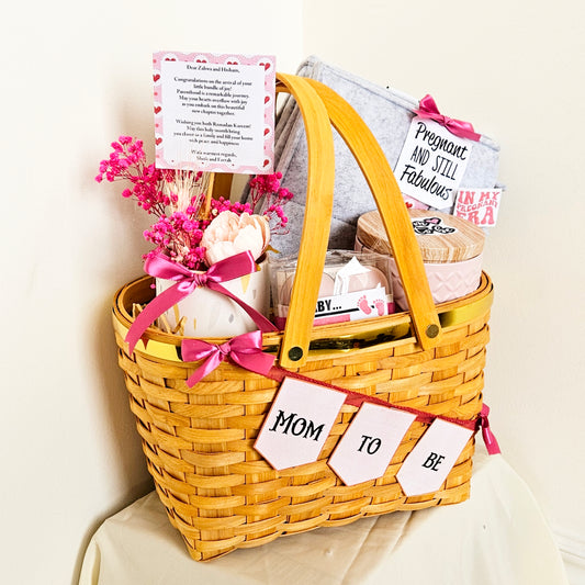 Mom To Be hamper for the expecting mommy in our gold rim picnic basket