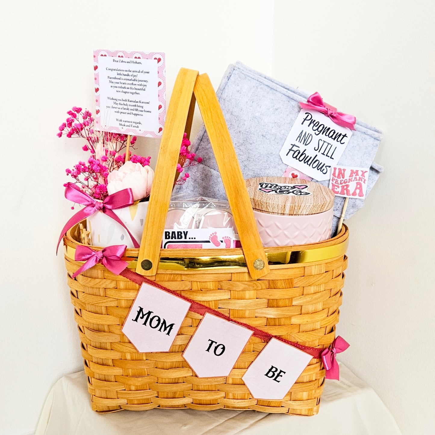 Mom To Be hamper for the expecting mommy in our gold rim picnic basket